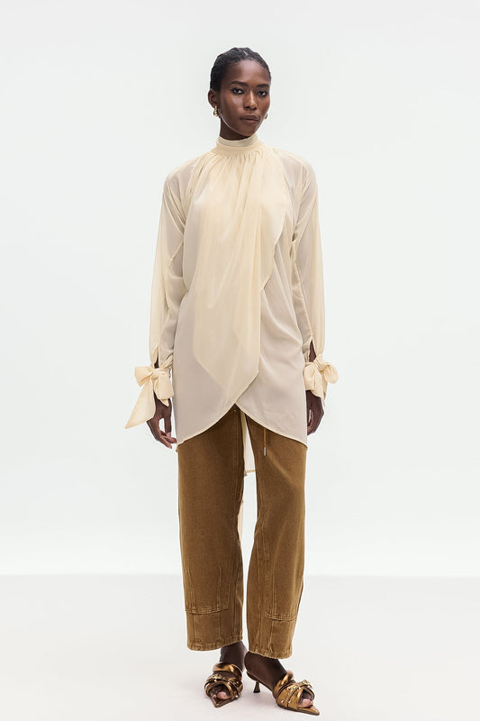 Ellalabel Bolormaa Lace Up Asymmetric Shirt In Apricot - Crafted from Intricate Lace Fabrication - Designed for Elegant Occasions.