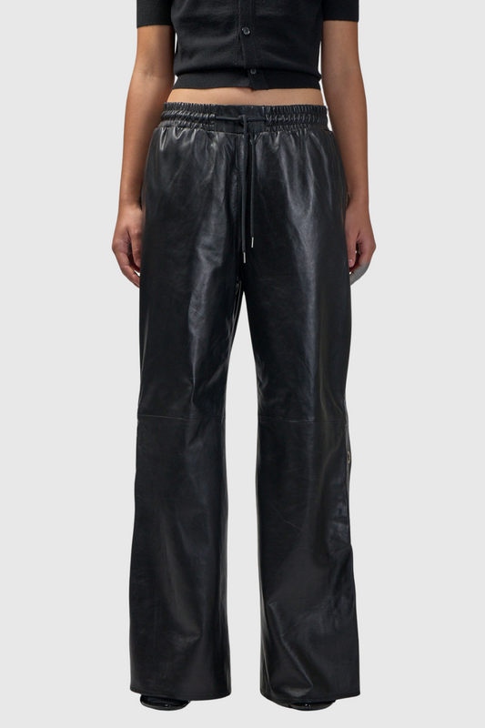 Ellalabel Danis Deconstruct Eyelet Leather Pants - Crafted from High-quality Fabrication - Designed for Elegant Occasions.